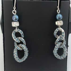 Givenchy blue crystal dangle earrings 3 inch long and 3/4 wide.
